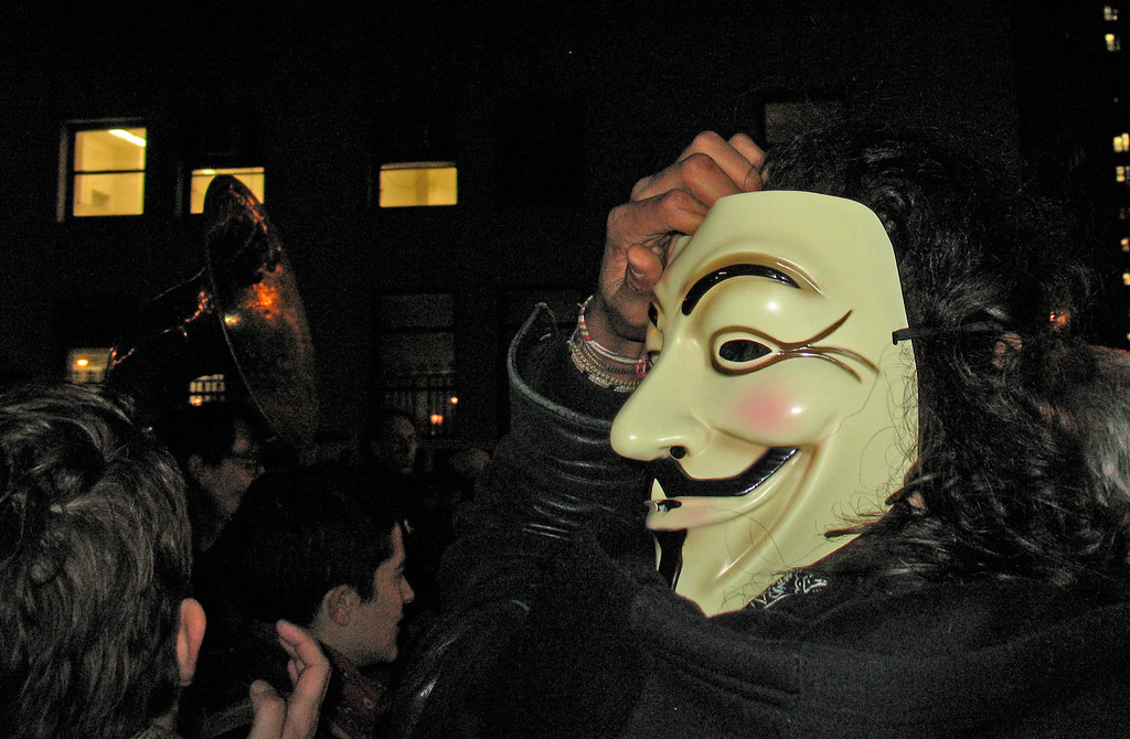 guy fawkes mask and tuba At the latest massive Occupy Wall… Flickr