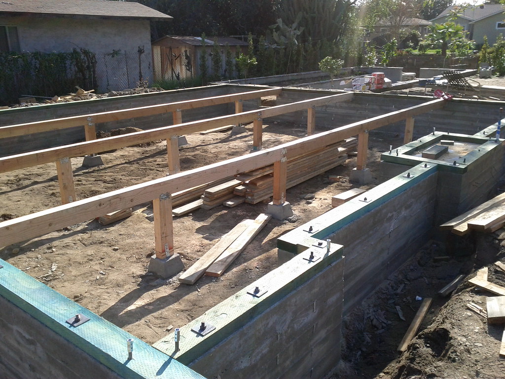 Girders Girders and sill plates are installed. There's a l… Flickr