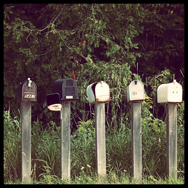 Letter boxes stand at the end of the road everyday, waitin… Flickr