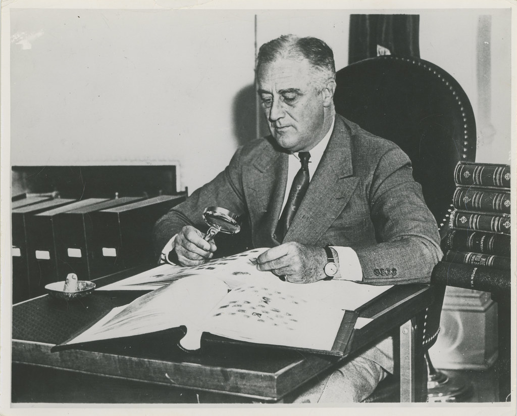 56577 President Roosevelt working with his stamp collecti… Flickr