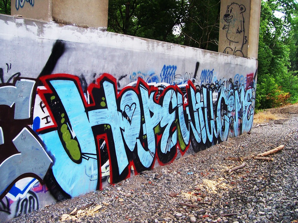 Kent Graffiti 2 Graffiti beneath a bridge in Kent, Ohio. The Upstairs Room Flickr