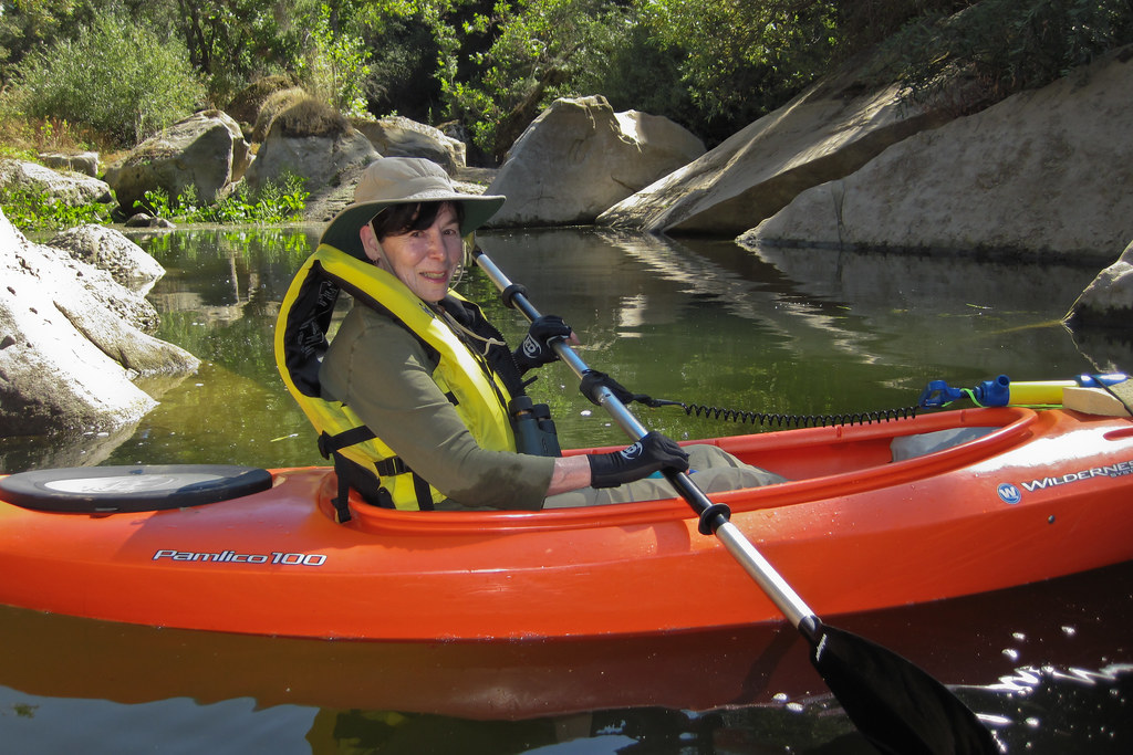 Jovette Mann in her sitinside kayak in a shady cove pho… Flickr