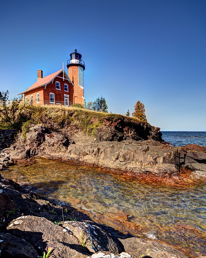 Eagle Harbor Light & Rocks © Luxgnos Photography / Brian