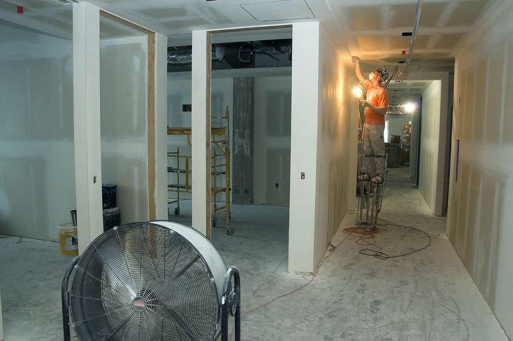 Sanding the walls Interior walls are prepped for painting.… Oregon