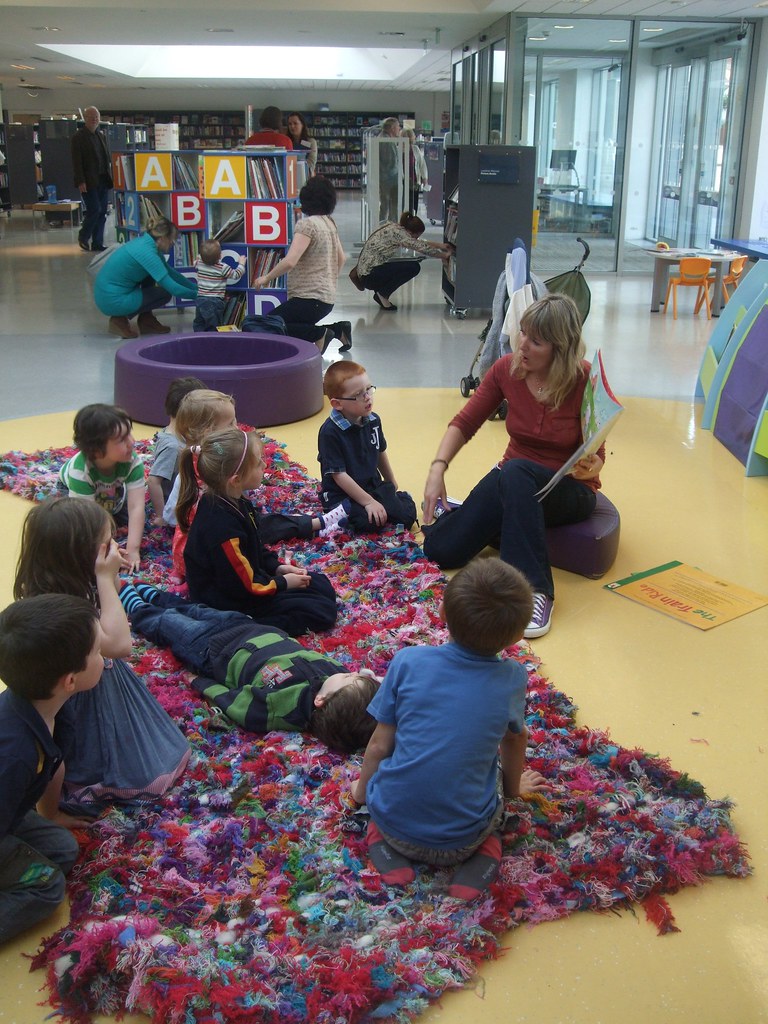 Storytime on the Giant Loom Rug Rug created by individuals… Flickr