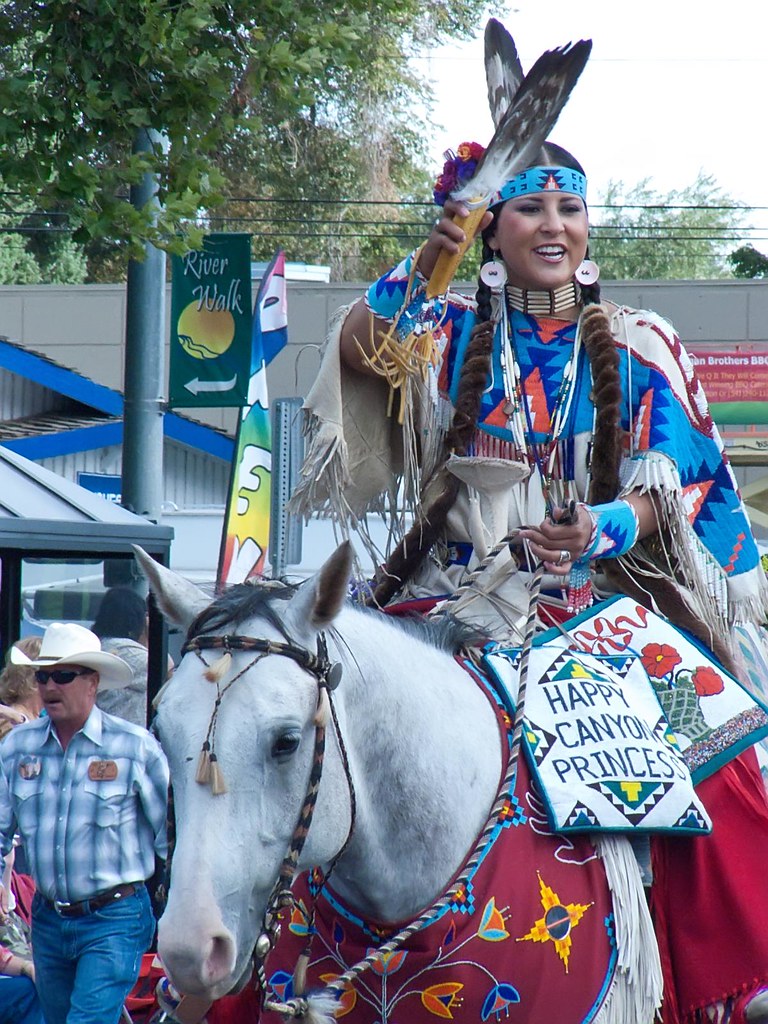 Native American Princess greets parade spectators at the 101st