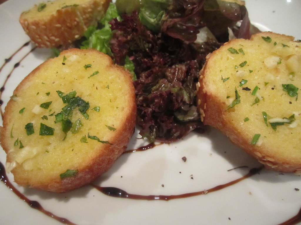 Garlic Bread Even the garlic bread was nicely plated at Q… Great