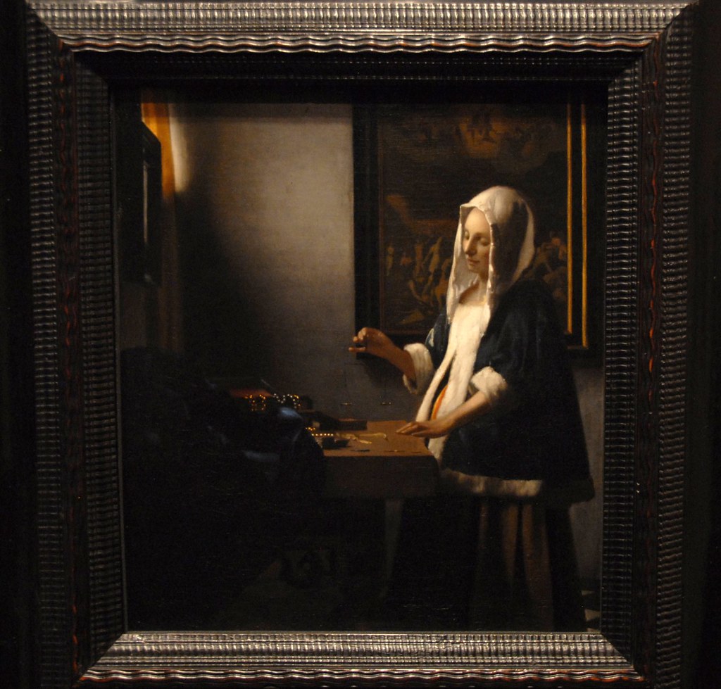Woman Holding a Balance This painting is titled Woman Hold… Flickr