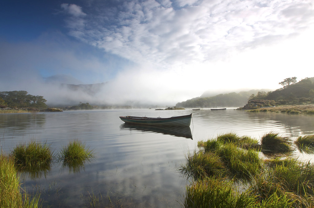 Upper Lake Killarney Fishing boats reflected in Upper Lake… Flickr