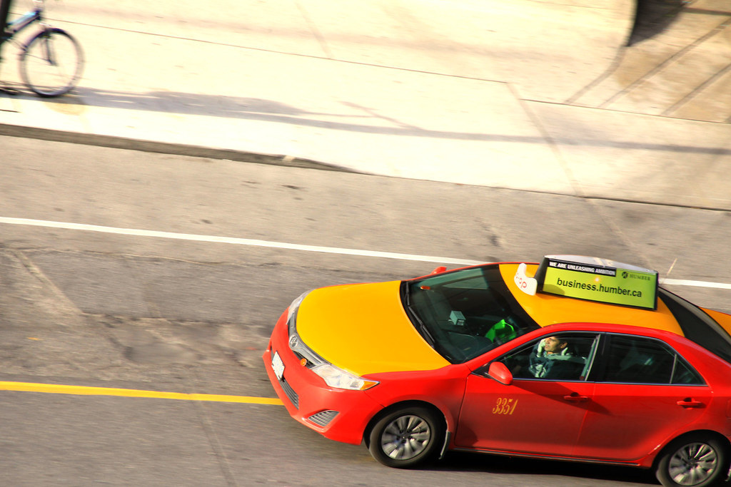 COOP Taxi Looking for a customer Don't use this image on … Flickr