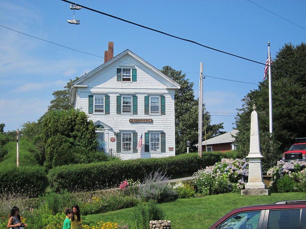 Chatham A monument, antique store, and sneakers hanging fr… Flickr