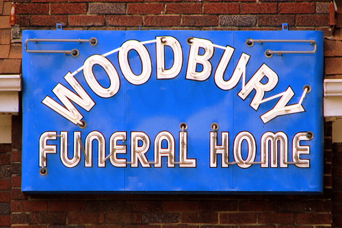See Middle Tennessee Woodbury Funeral Home neon sign day and night