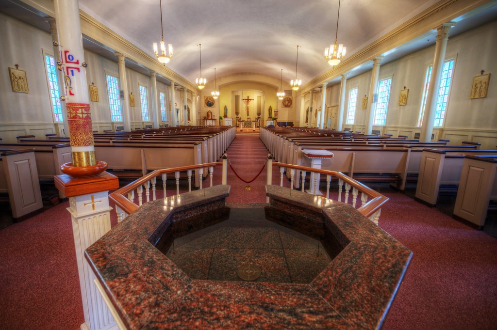 St Joachim's Church baptismal font and view of interior a photo on
