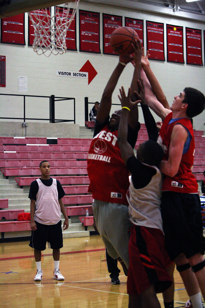 Lakota West boys' basketball Players fight for the rebound… Flickr