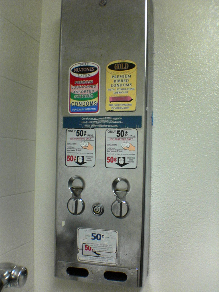 Condom machine on 2nd floor men's bathroom, Admin building… Flickr