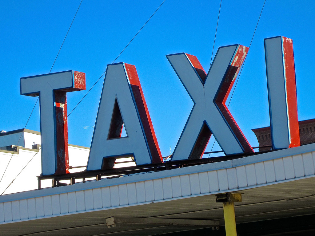Taxi, Nashua, NH A large TAXI sign in Nashua, New Hampshir… Robby