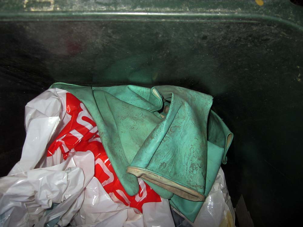 My used Green Marigold Rubber Gloves In the trash they end… Flickr