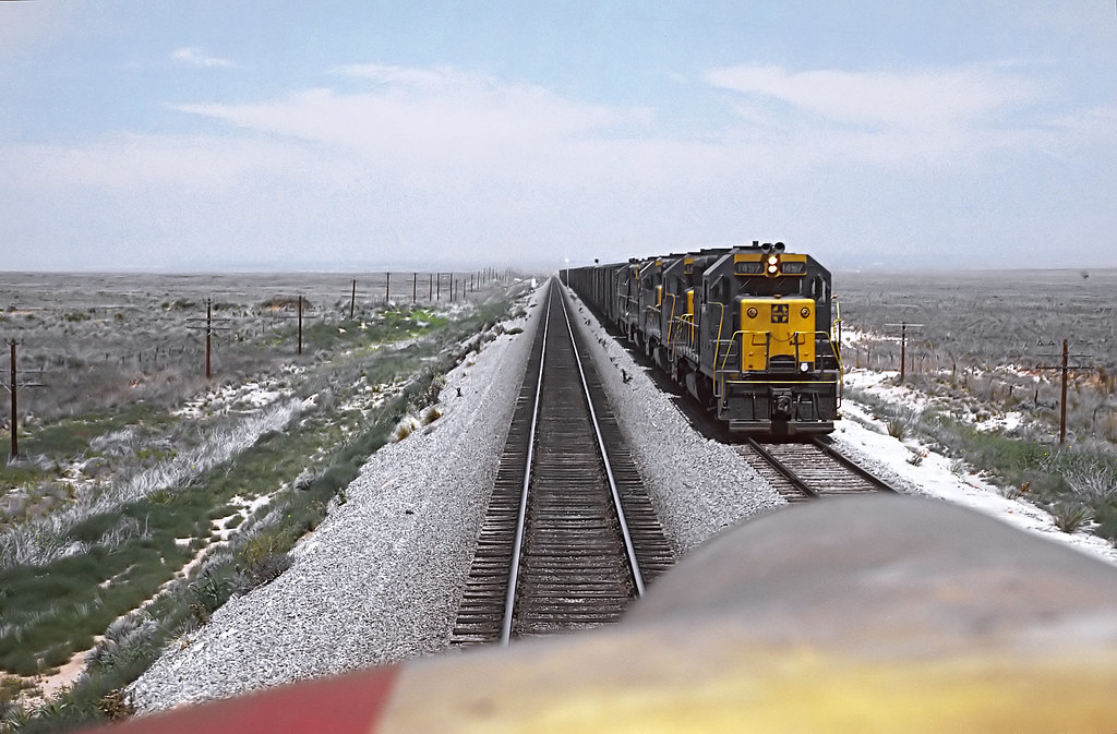 ATSF 1457 a GP35 freight at La Lande, NM taken from cab of… Flickr