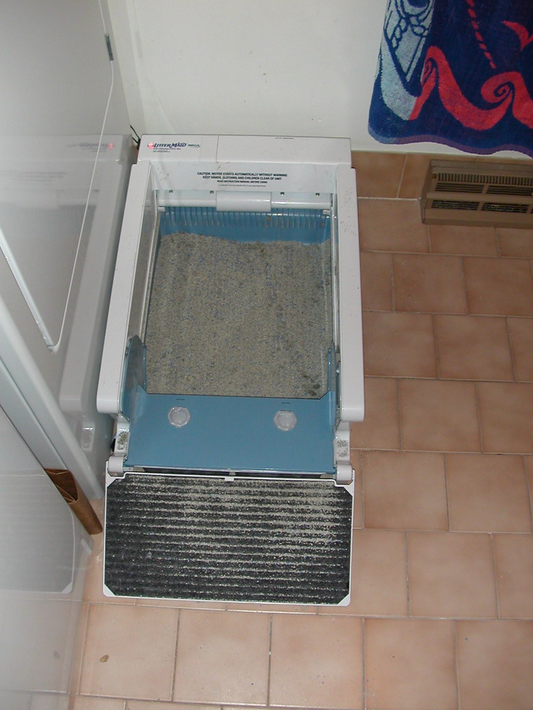 Automatic litter boxes are amazing Derik DeLong Flickr