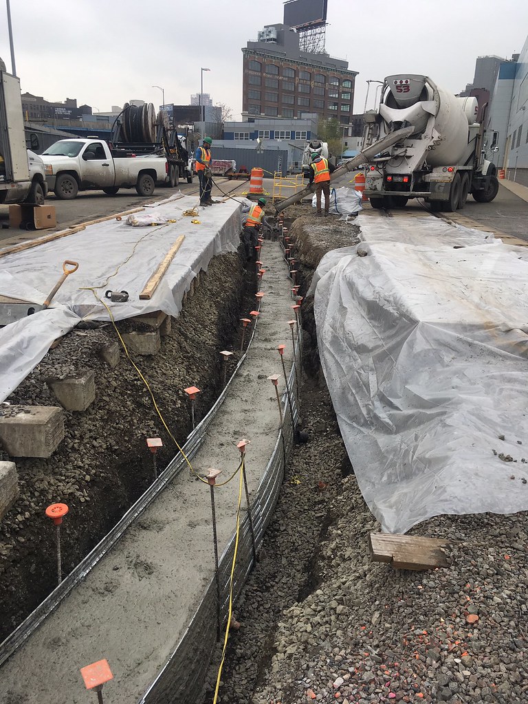 Pouring concrete over traction power ductbanks near the Mo… Flickr