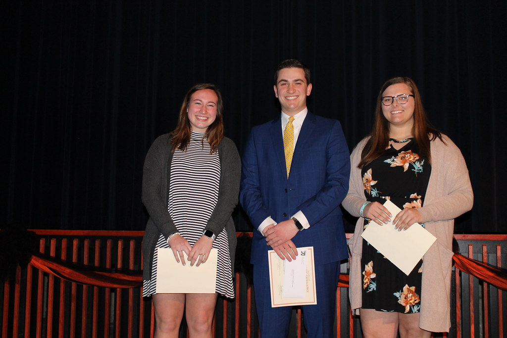 Wisconsin Excellence Award Recipients 3 people smiling Plymouth