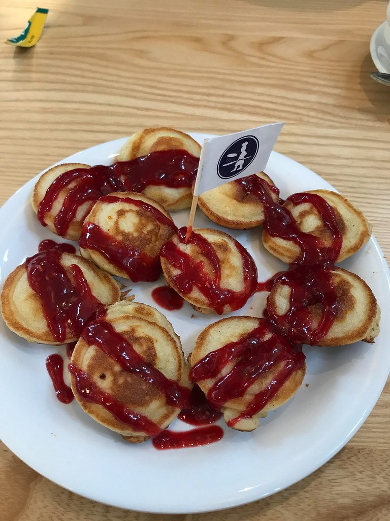 Poffertjes with raspberry sauce Pancakes Amsterdam Poffe… Flickr