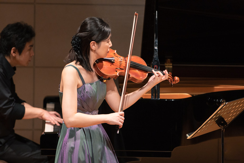 Pianist and violinist playing at concert hall Pianist and … Flickr
