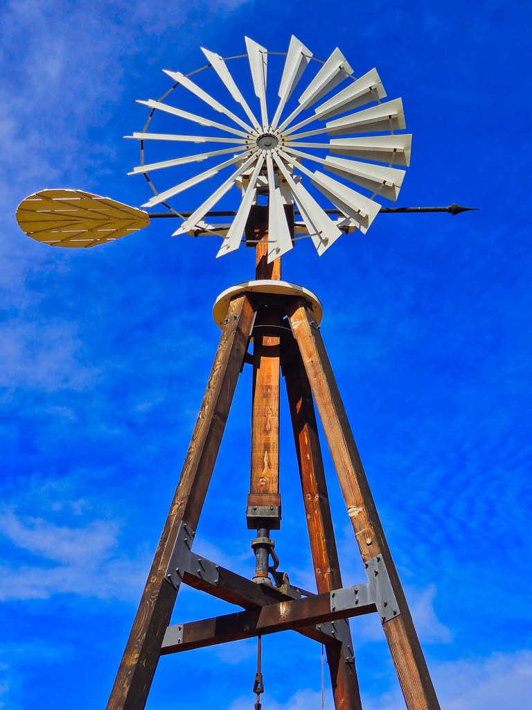 Wind Powered Wellwater Pump The contrasting colors of ora… Flickr