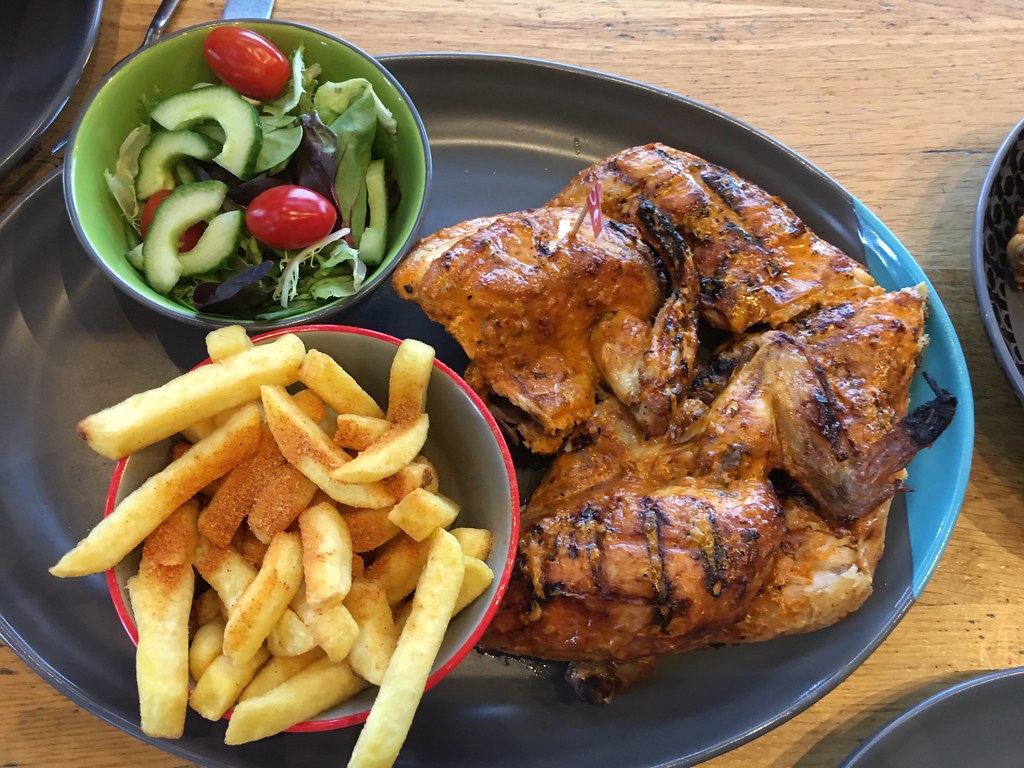Roasted chicken, Nando’s Restaurant, England Roasted chick… Flickr