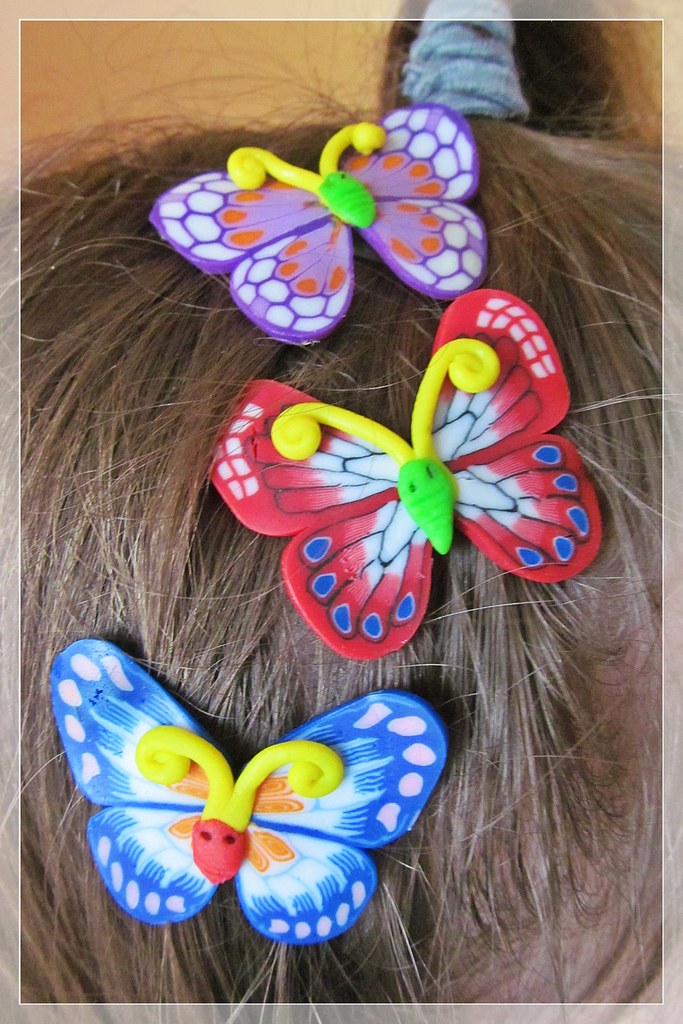 butterflies in the hair...! ) Fancy hair clips of my daug… Flickr
