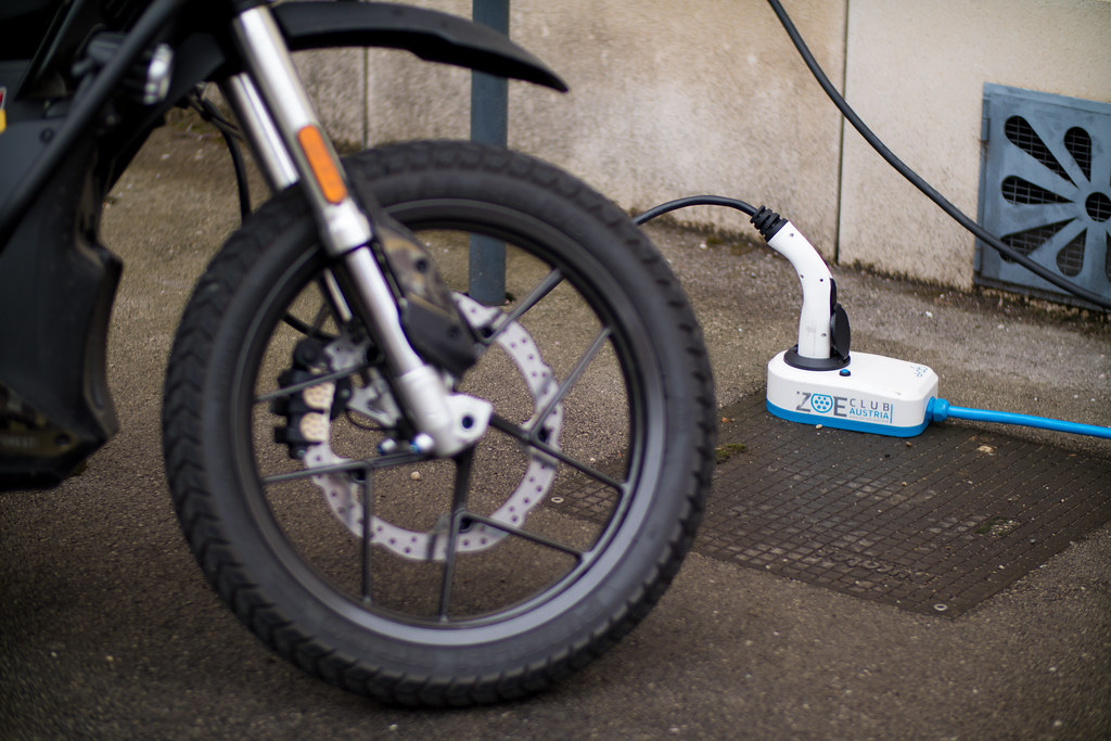 Electric dirt bike pluged into a charger Shot on Canon EOS… Flickr