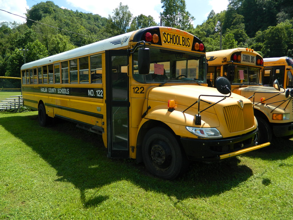 Harlan County Schools 122 (2) Bus lot Harlan, KY. Flickr