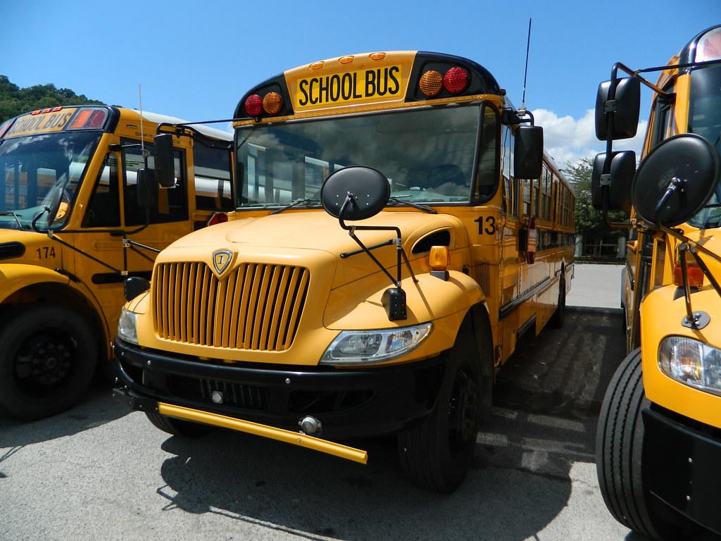 Harlan County Schools 134 (2) Bus lot Harlan, KY. Flickr