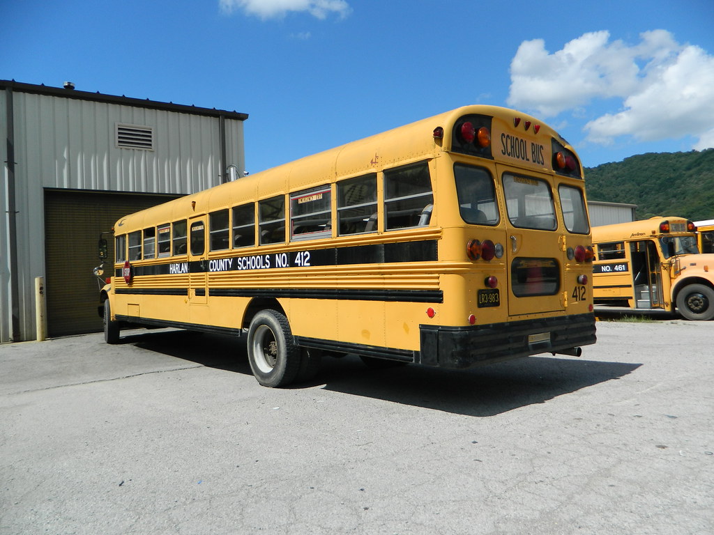 Harlan County Schools 412 (2) Bus lot Harlan, KY. Flickr