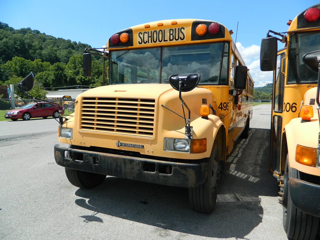 Harlan County Schools 495 (2) Bus lot Harlan, KY. Flickr