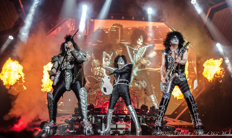 Feel my heat takin' you higher, burn with me, The O2's on fire. KISS