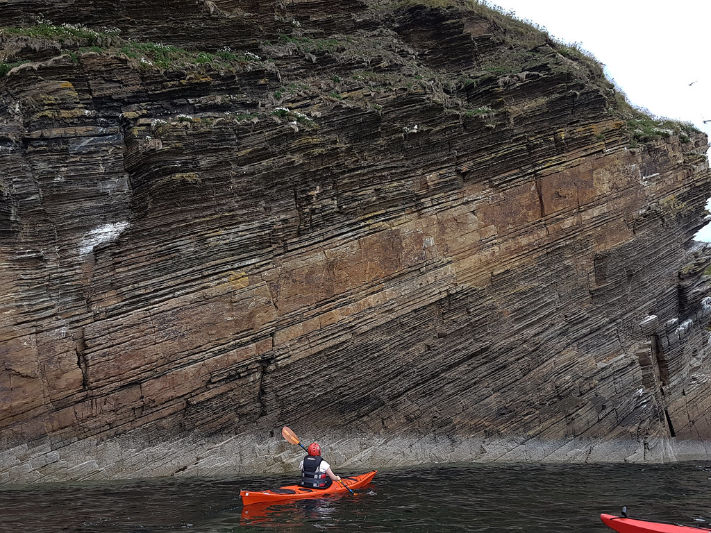 Tilted rock strata below Forse Castle ruin. Tilted rock st… Flickr