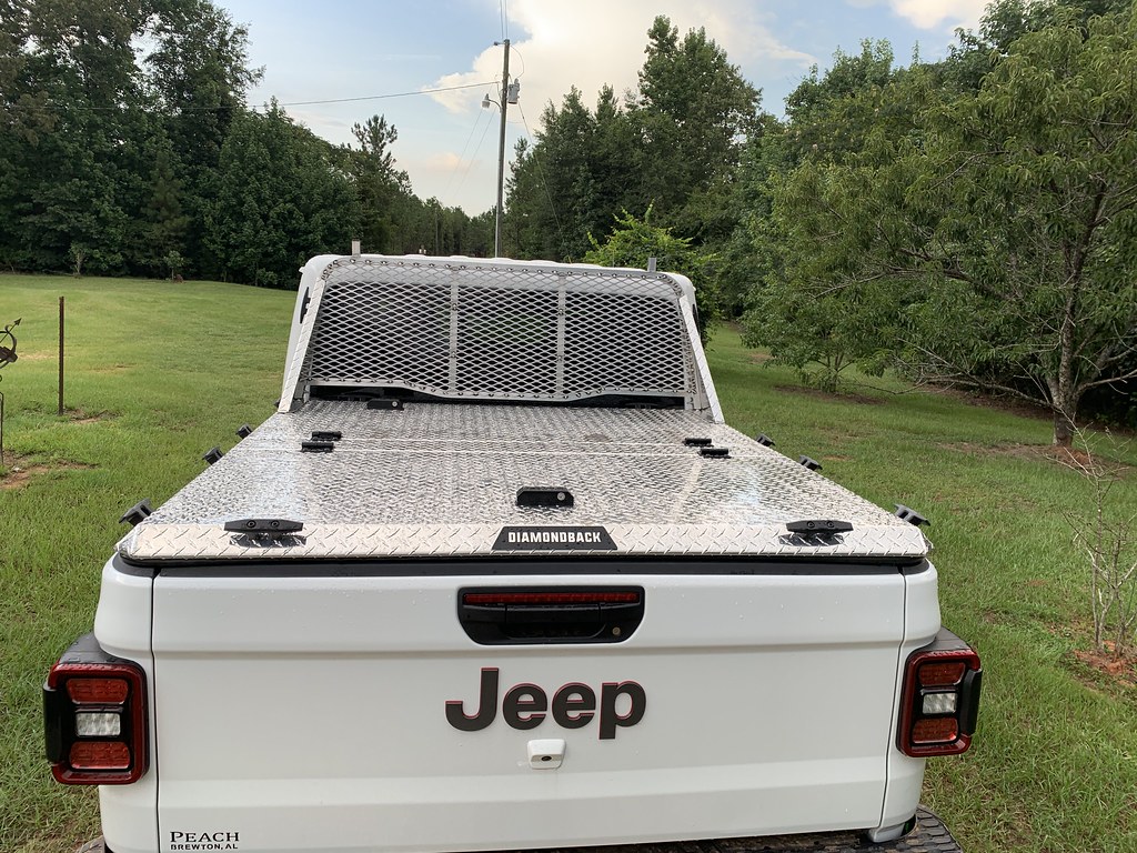 A Heavy Duty Truck Bed Cover On A Jeep Gladiator A polishe… Flickr