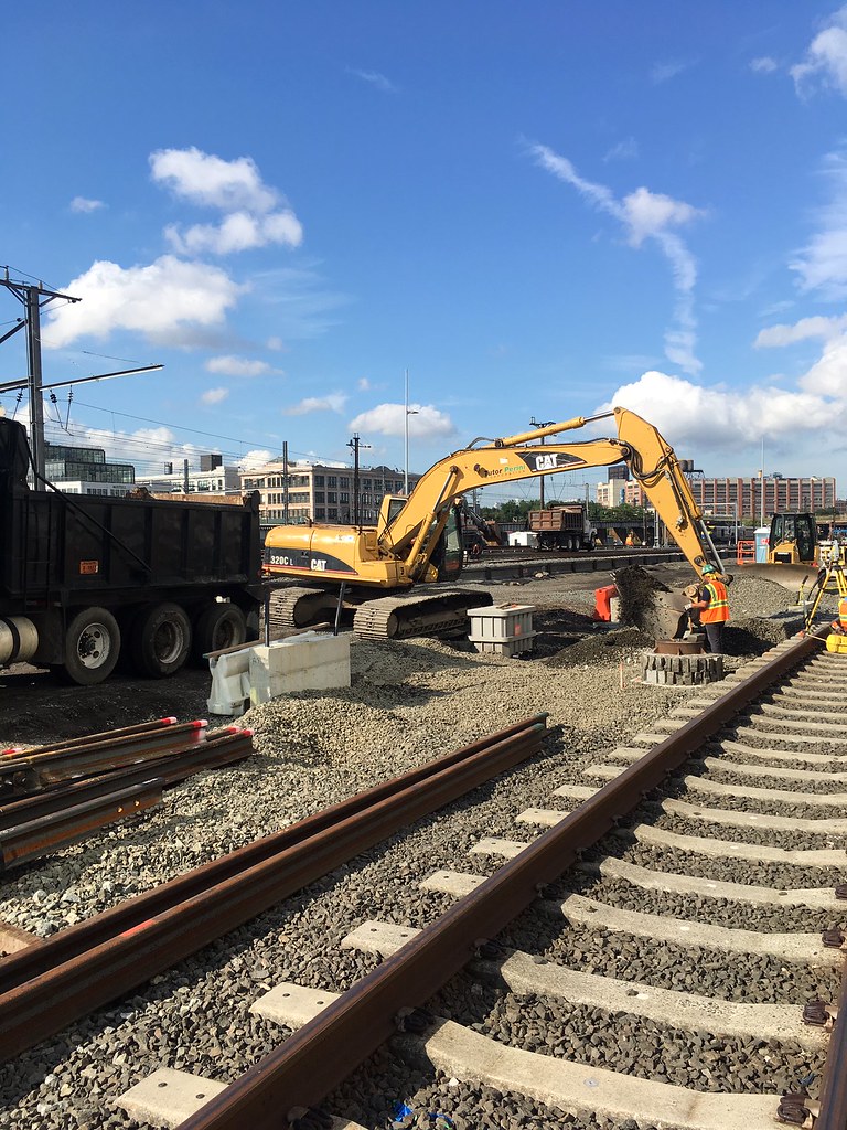 Excavating a trench to run underground conduit west of Tho… Flickr