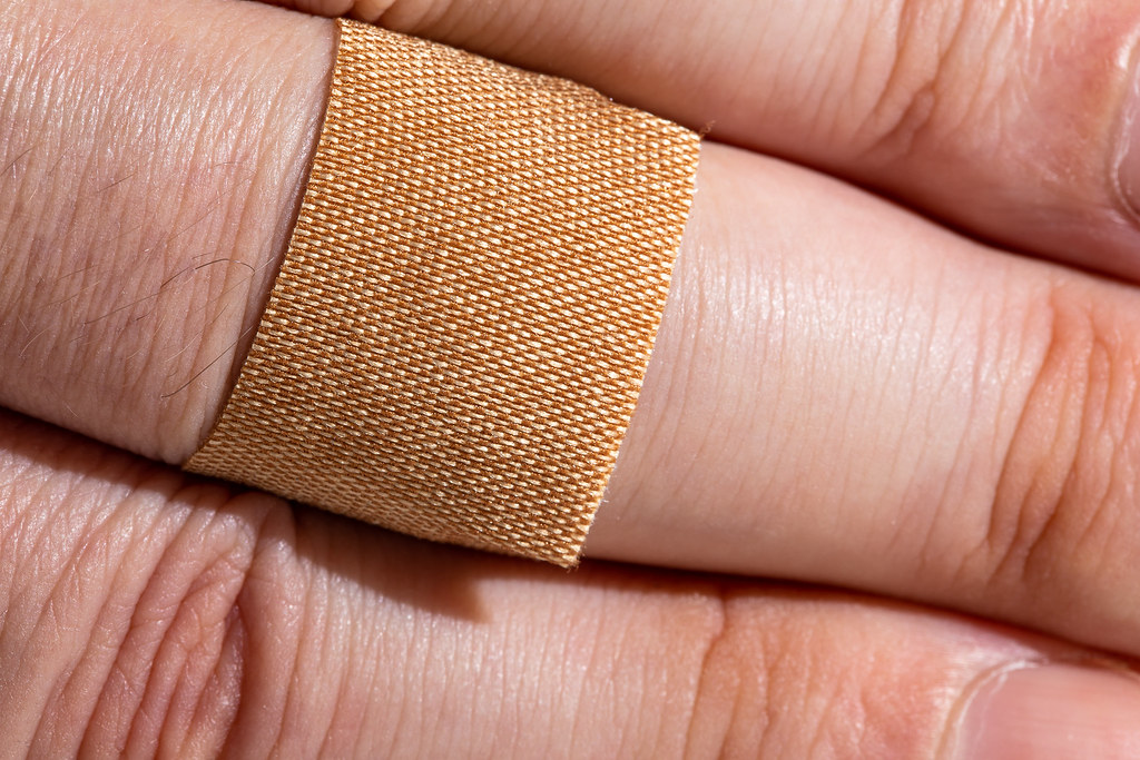 scraped knuckle Bandage on knuckle (care for a scraped knu… Flickr