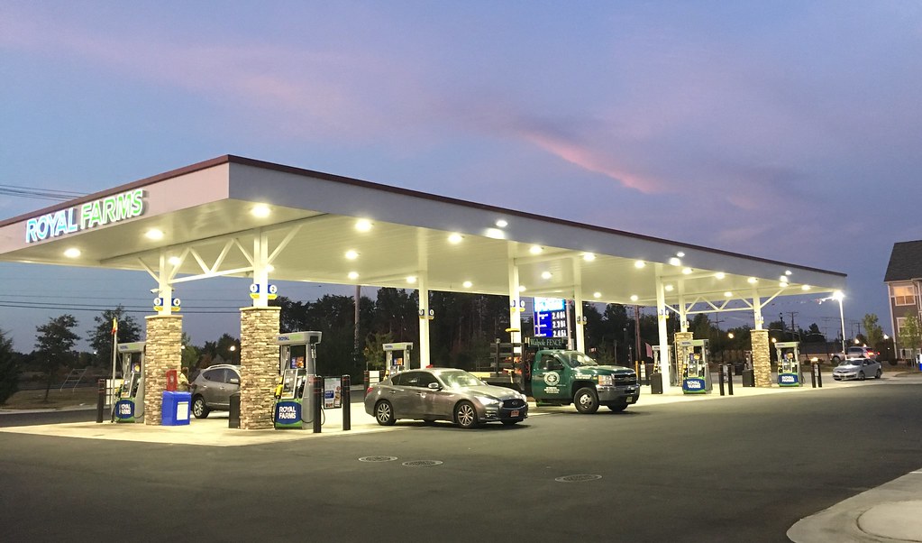 Brand new gas station at dusk, squeaky clean.. Yngve Roennike Flickr