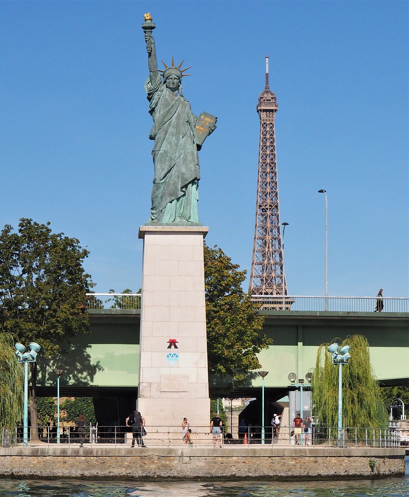 Statue of Liberty and Eiffel Tower The statue was given in… Flickr