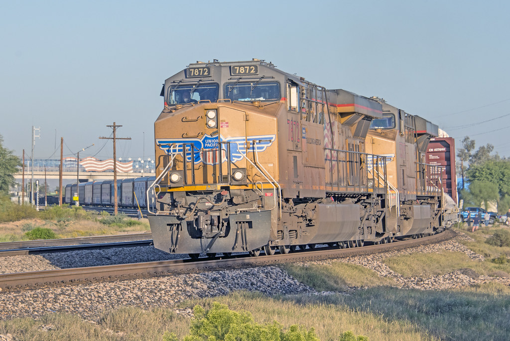 Union Pacific 7872 leads 5395 and an eastbound freight train departing