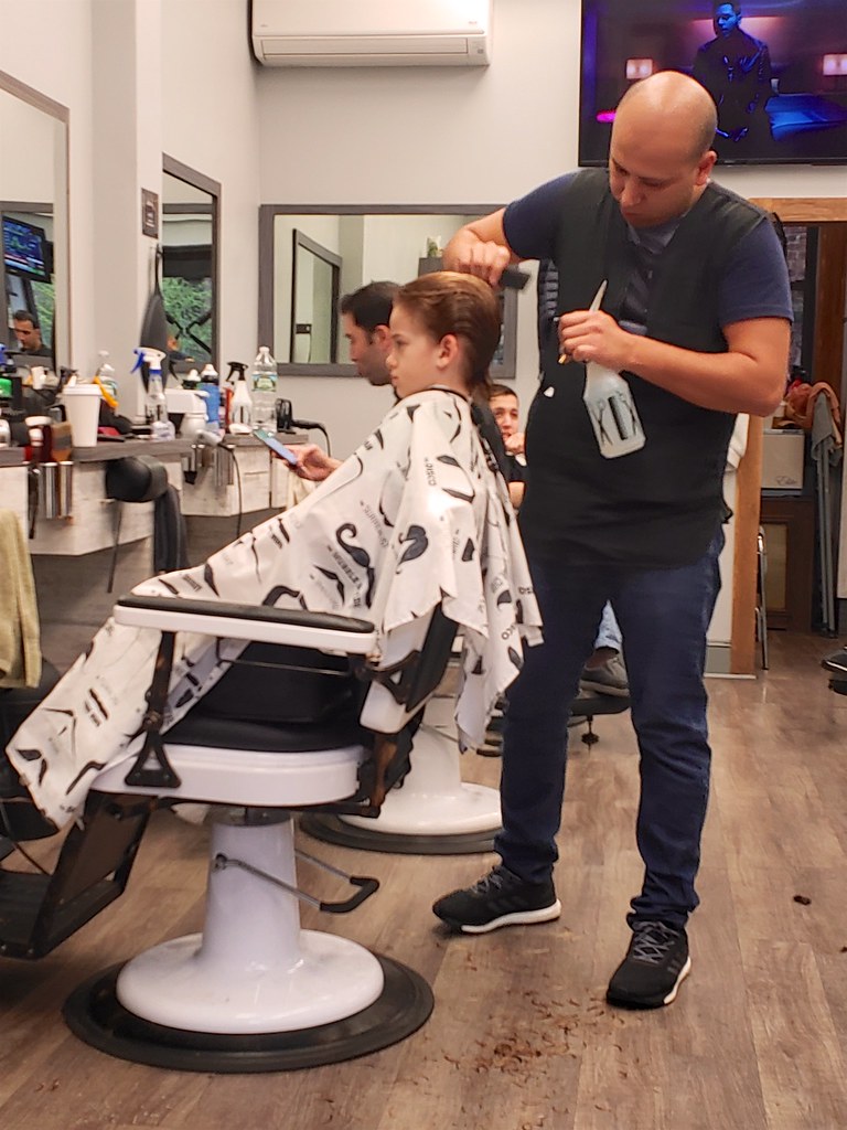 Everett Getting A Haircut At Hills Barber Shop. Flickr