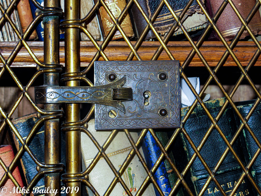 Locked out!! The locked library shelves at Arley Hall. Mike Flickr