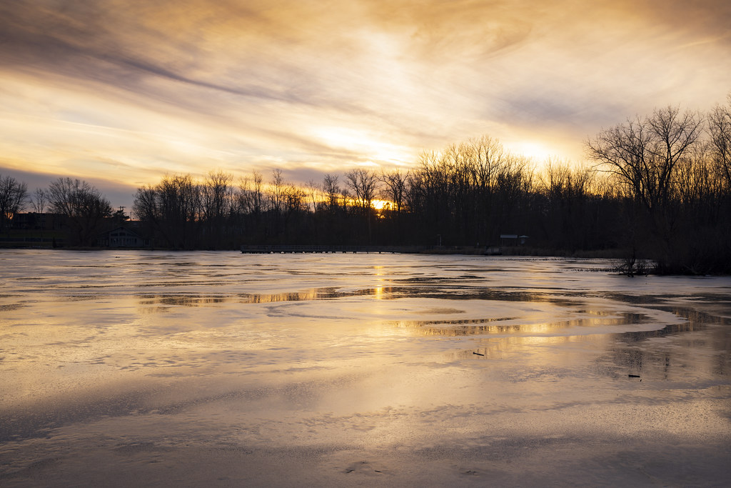 Sunset on a Frozen Lake Reeds Lake, Grand Rapids, Michigan… Flickr