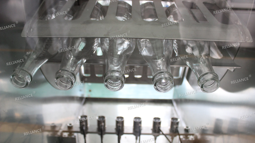 wine and spirit filling capping machine RELIANCE wine bott… Flickr