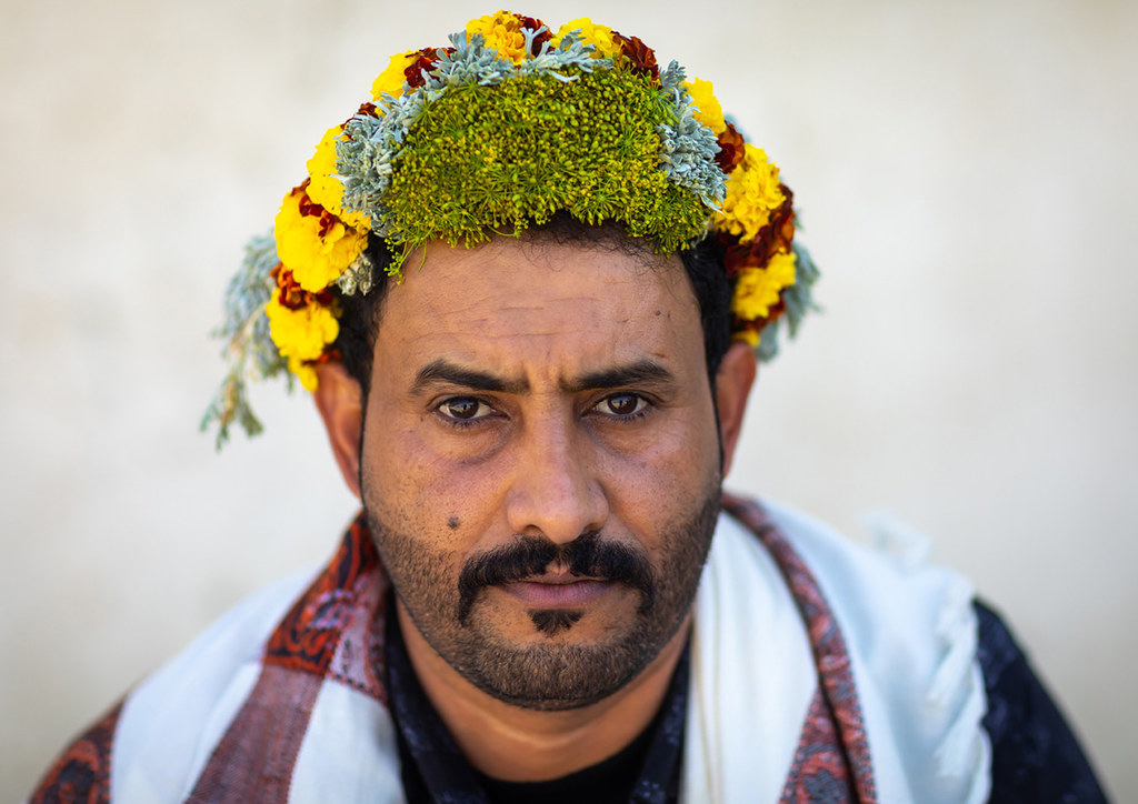 Portrait of a flower man wearing a floral crown on the hea… Flickr