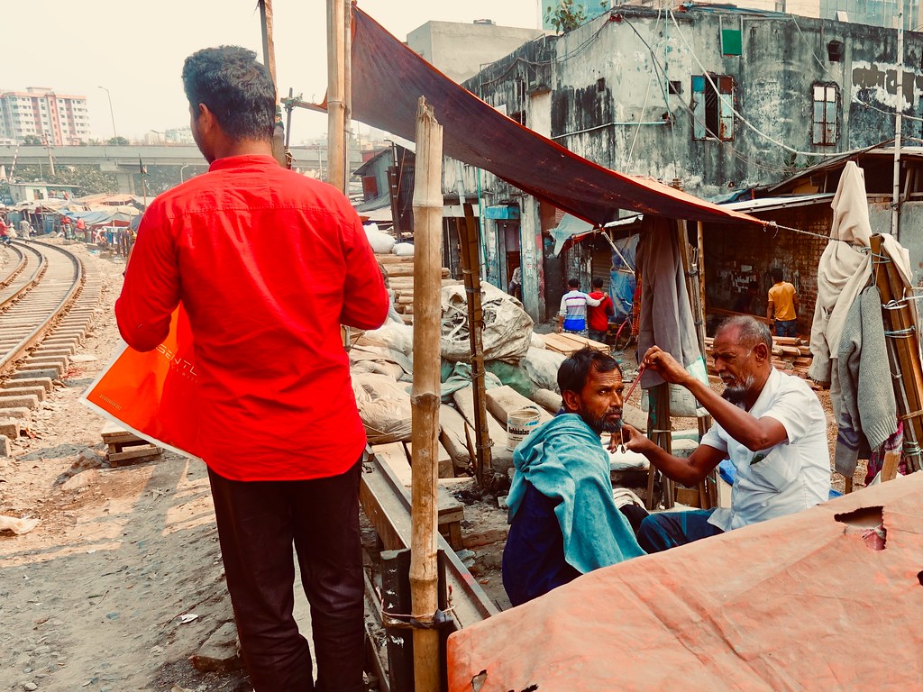Looking down on Kawran Bazar from the railway above. A … Flickr