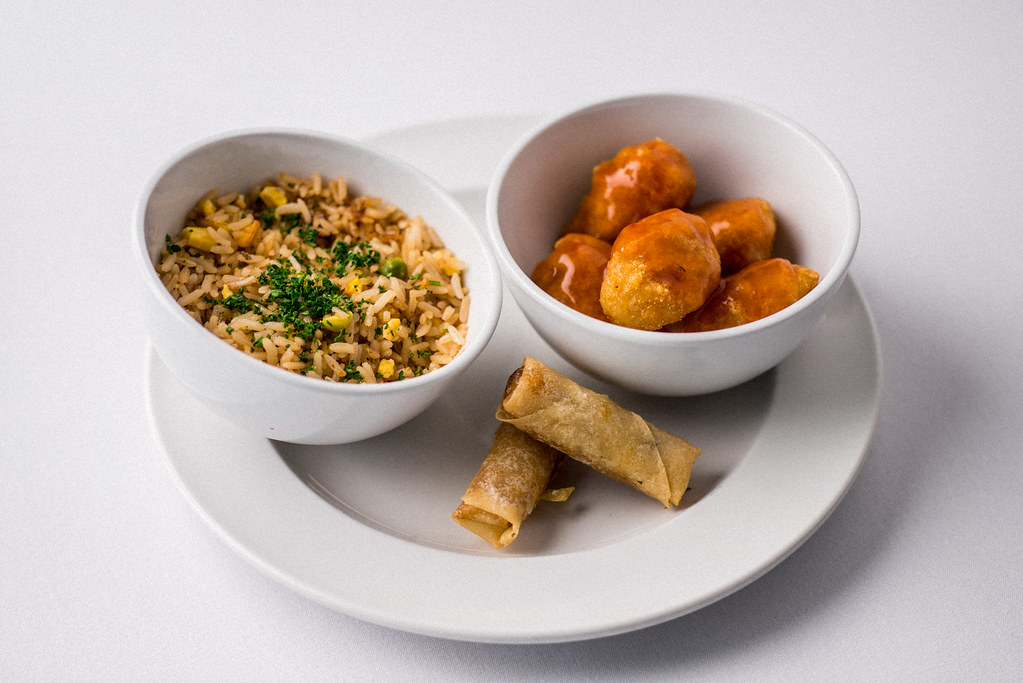 Food Fried rice, sweet and sour chicken balls, and spring … Flickr